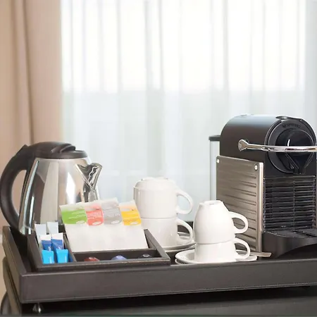 فندق إن إتش سيتي سنتر 4*